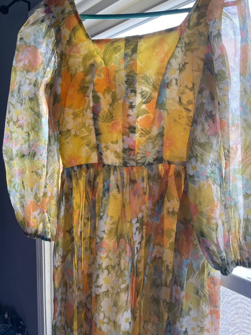Beautiful vintage floral maxi with shear long sleeves.